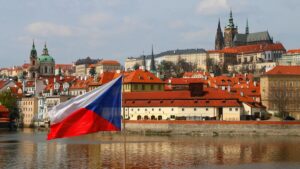 Flaga Czech na tle Pragi